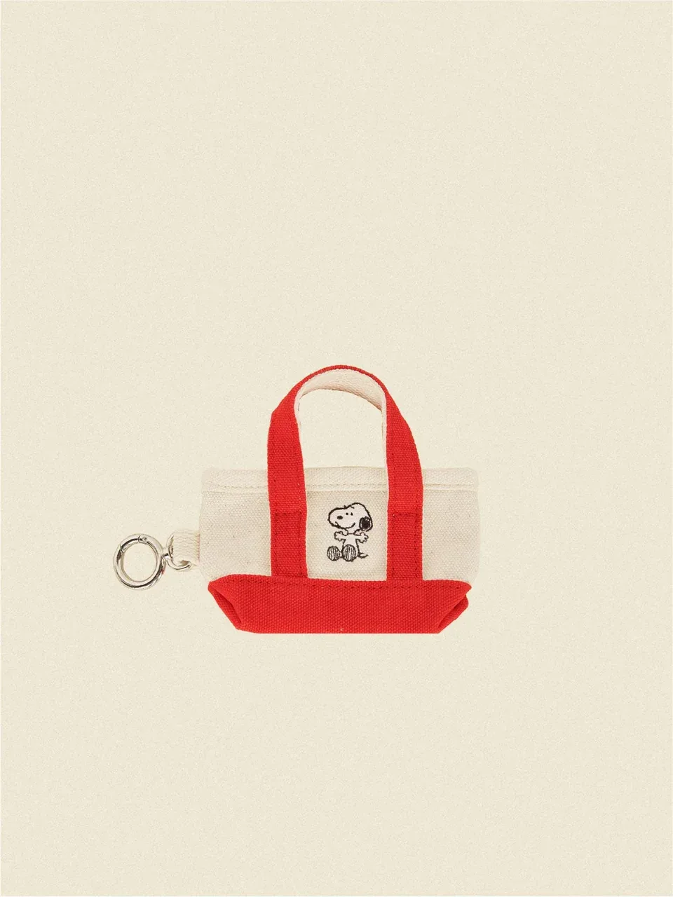The Little Beast Snoopy Poop Bag Tote in Black or Red - Image 2