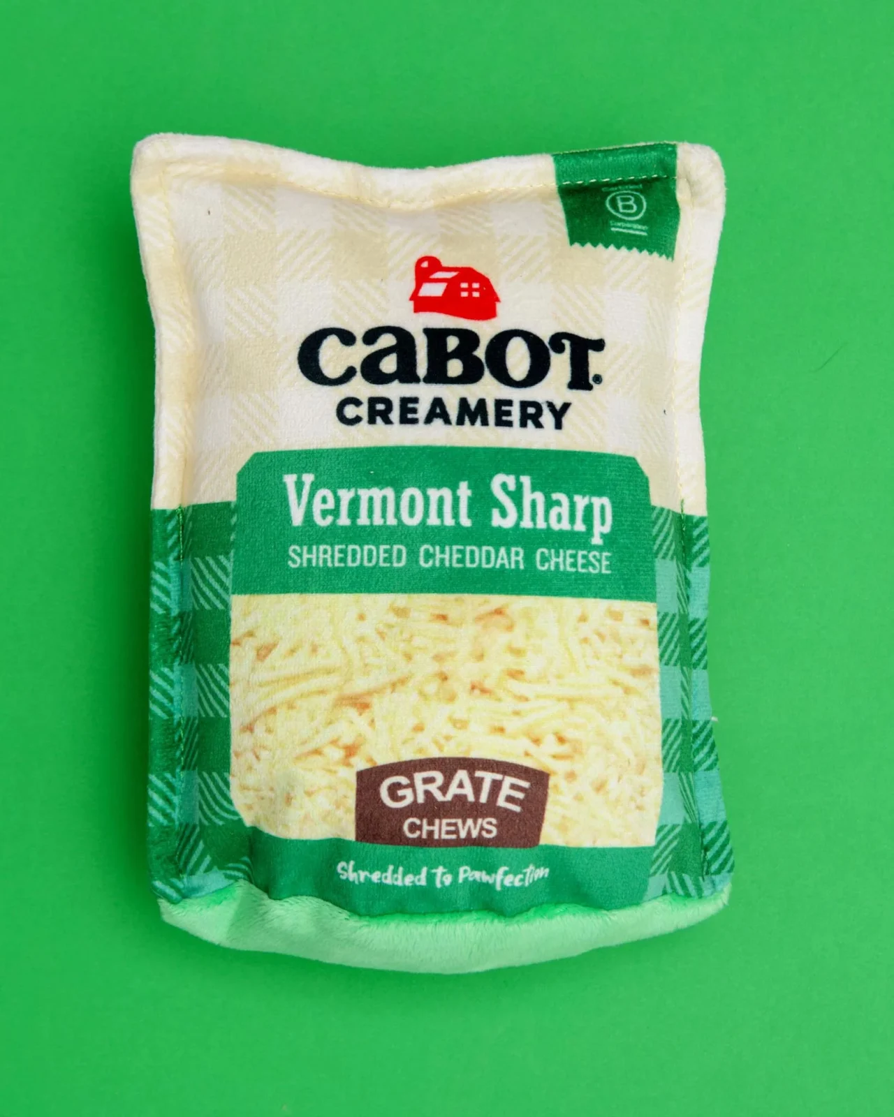 P.L.A.Y. X Cabot Creamery Vermont Cheddar Shredder Squeaky Plush Dog Toy