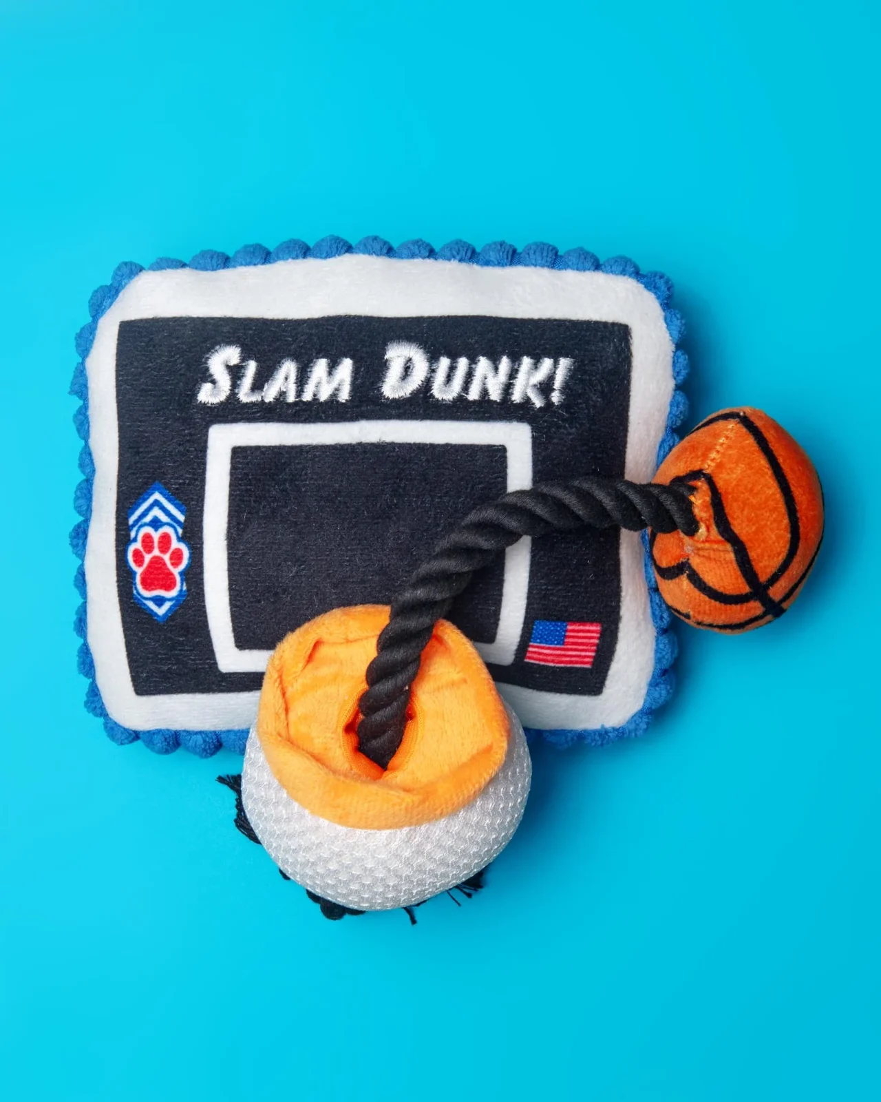 Take it to the Hoop Squeaky Plush Dog Toy
