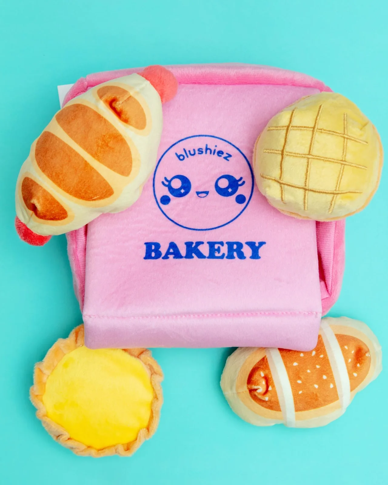 Bakery Box Interactive Plush Dog Toy
