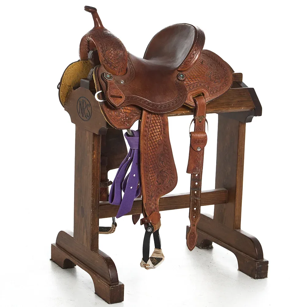 Teskey's Used 13.5in 3/4 Breed Floral and Diamond Stamp Barrel Saddles